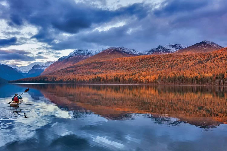 Sea kayaking on Bowman Lake in autumn in Glacier National Park, Montana, USA 