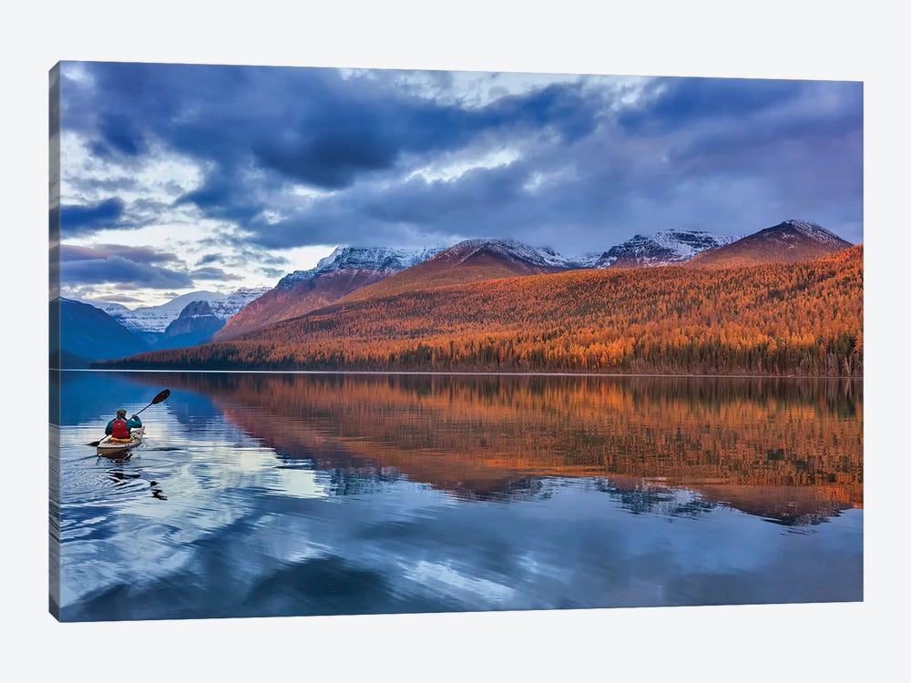 Sea kayaking on Bowman Lake in autumn in Glacier National Park, Montana, USA  by Chuck Haney 1-piece Art Print