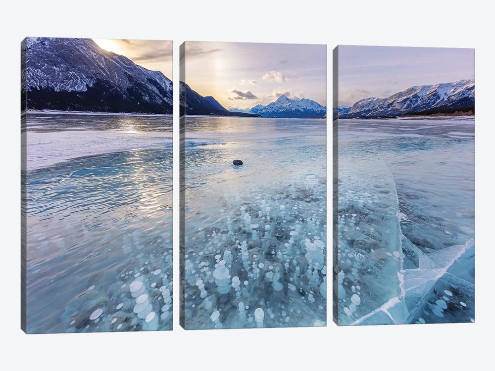 Methane ice bubbles under clear ice on Abraham Lake near Nordegg, Alberta, Canada by Chuck Haney 3-piece Canvas Art