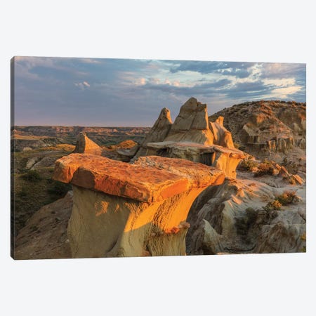 Sculpted badlands formations at first light in Theodore Roosevelt National Park, North Dakota, USA Canvas Print #UCK72} by Chuck Haney Canvas Art Print