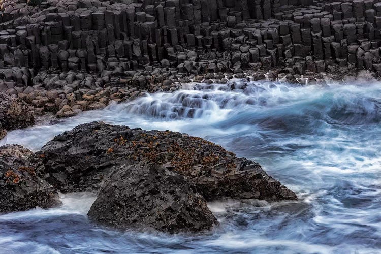 Waves crash into basalt at the Giant's Causeway in County Antrim, Northern Ireland