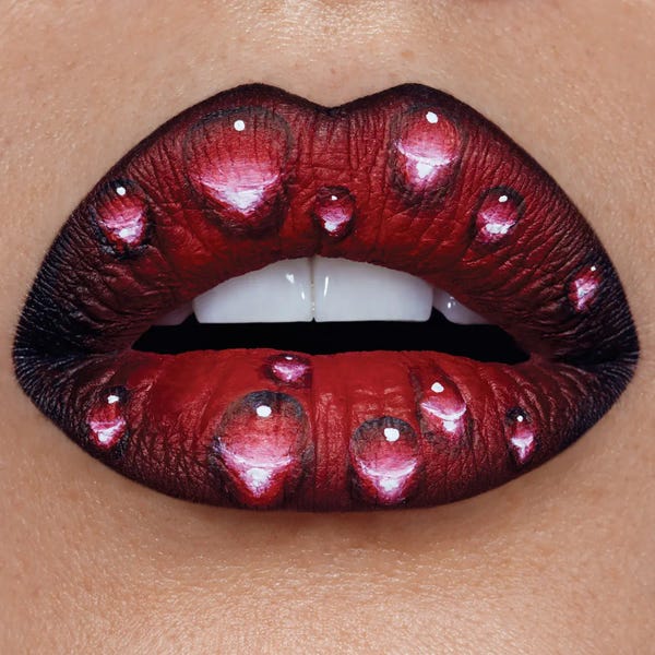 Rain: Rose Drops by Vlada Haggerty