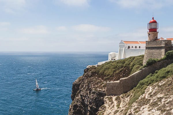 Cliffs: Portugal Lighthouse And The Boat by Alexandre Venancio