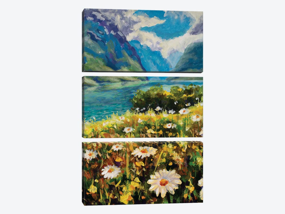 Big Wildflowers Of Chamomile On Bank Of Emerald River Against Backdrop Of Mountains by Valery Rybakow 3-piece Canvas Wall Art