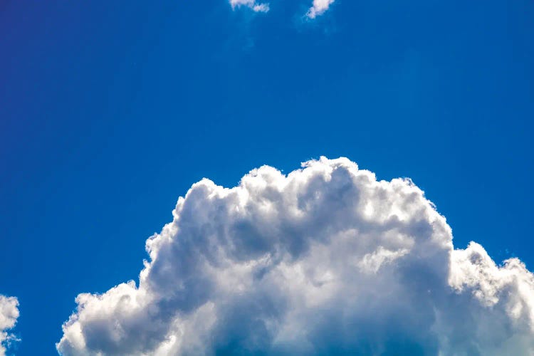Close-up cumulus cloud with blue sky