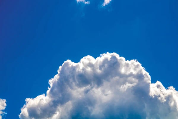 Valery Rybakow: Close-up cumulus cloud with blue sky by Valery Rybakow
