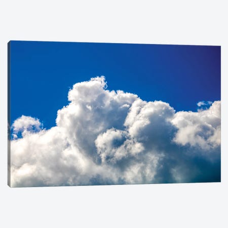 Gloomy dramatic cloudy blue sky background with fleecy curly soft white clouds. Canvas Print #VRY407} by Valery Rybakow Canvas Art Print