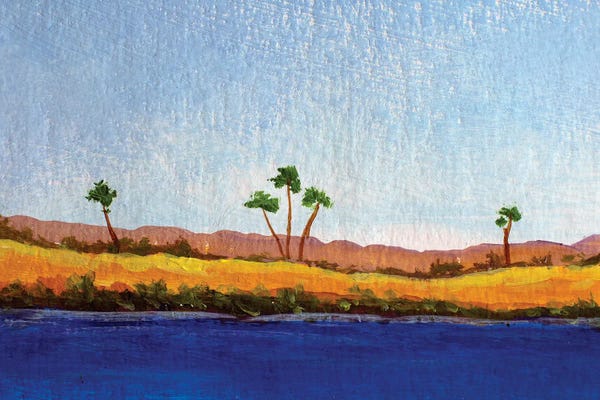 Yellow Sand And Palm Trees On Far Shore Blue Sea