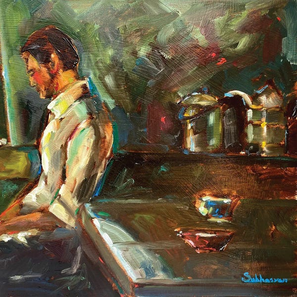 Young Man Sitting By The Window