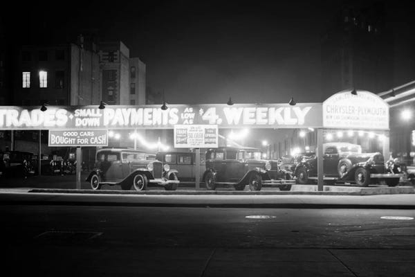 Manhattan: 1930s New And Used Car Lot At Night Automobile Sales Sixth Avenue & Waverly Street Greenwich Village New York City USA by Vintage Images