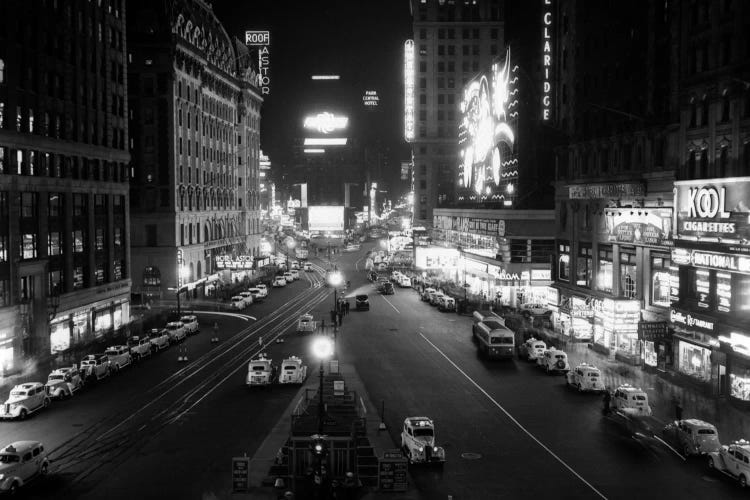 1930s Overhead Of Times Square Lit Up At Night With Cars Lining Curbs NYC NY USA