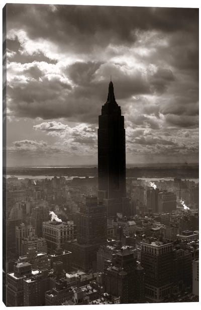 1930s-1940s Empire State Building Silhouetted Against High Gathering Storm Clouds Covering NYC New York USA Canvas Art Print - Sepia Photography