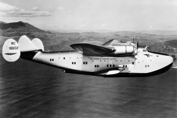 By Air: 1930s-1940s Pan American Clipper Flying Boat Airplane In Flight by Vintage Images