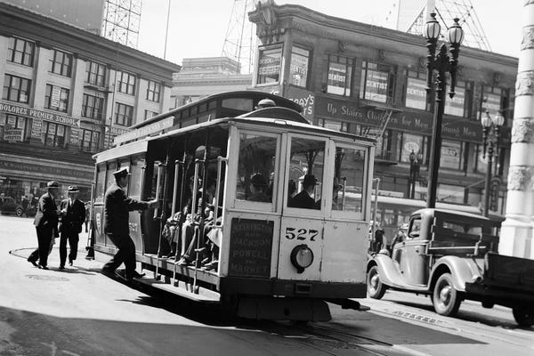San Francisco: 1937 Anonymous Silhouetted Cable Car Gripman Turning Car Around At Market Street San Francisco California USA by Vintage Images