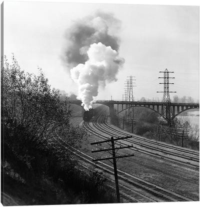 1940s Aerial Of Train Traveling Along River Under Bridge Billowing Smoke Near Columbus Ohio Canvas Art Print - Railroad Art