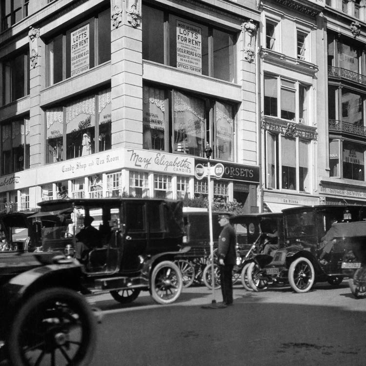 1910s A Policeman Controls Traffic On Fifth Avenue Before WWI Using A Hand Operated Semaphore Signal New York City USA