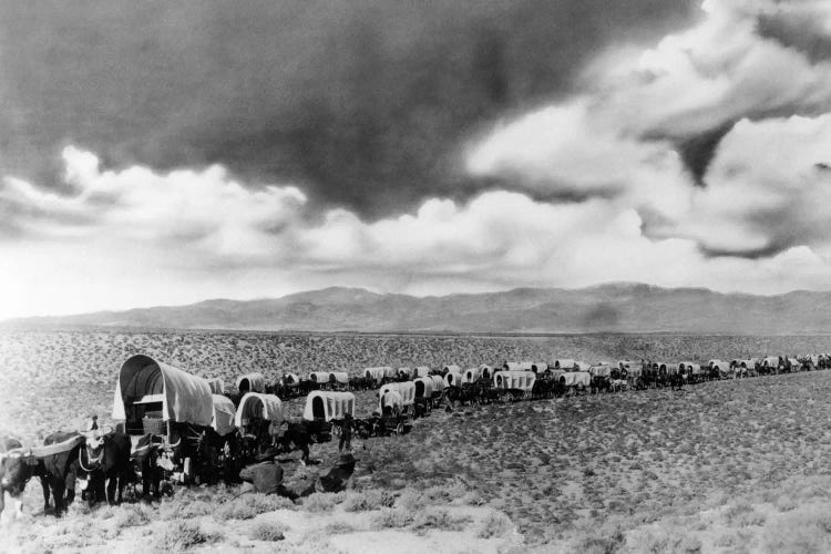 1870s-1880s Montage Of Covered Wagons Crossing The American Plains