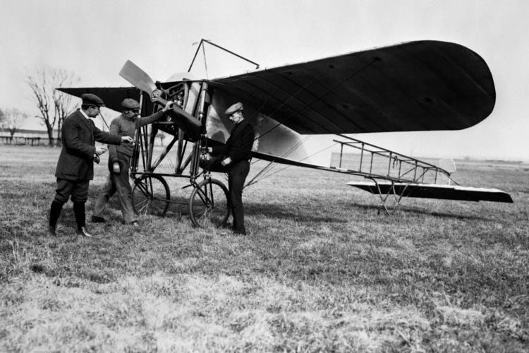 1910s Group Of Three Men Standing In Front Of Early Monoplane One With Hand On Propeller