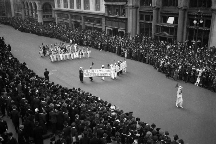 1910s Overhead View Of A Large Crowd Watching People Marching In A Suffrage Parade Circa 1914