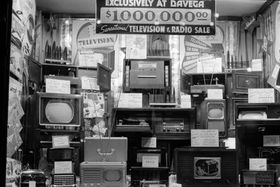 1940s Window Of Store Selling Radios And Televisions Advertising A Million Dollar Sale by Vintage Images canvas print