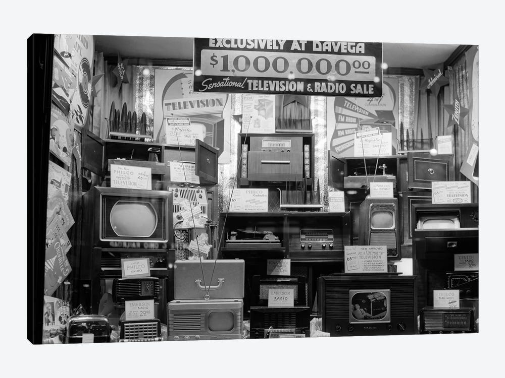 1940s Window Of Store Selling Radios And Televisions Advertising A Million Dollar Sale by Vintage Images 1-piece Canvas Art Print