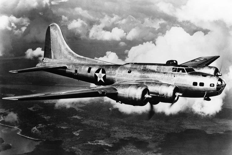 1940s World War II Airplane Boeing B-17E Bomber Flying Through Clouds