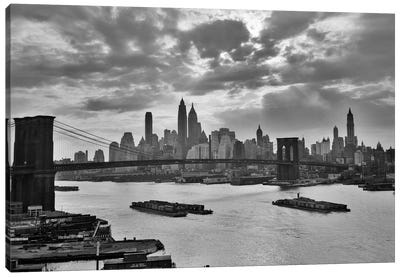 1940s-1950s Dramatic Sunset Downtown New York City Skyline With Brooklyn Bridge Barges In East River NYC, NY, USA Canvas Art Print - Vintage Images