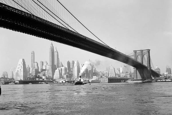 Famous Bridges: 1940s-1950s Skyline Of Lower Manhattan With Brooklyn Bridge From Brooklyn Across The East River by Vintage Images