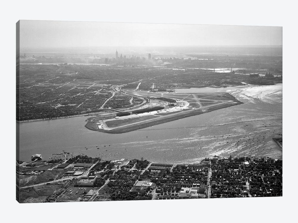 1950s Aerial Across Flushing Bay La Guardia Airport College Point Queens Manhattan Skyline In Distance Looking West by Vintage Images 1-piece Canvas Art