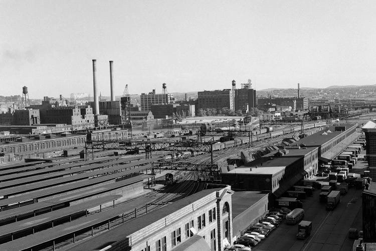 1950s Aerial Of Railroad Yard At Industrial Site Surrounded By Factories