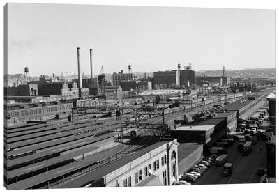 1950s Aerial Of Railroad Yard At Industrial Site Surrounded By Factories Canvas Art Print