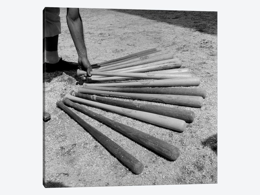 1950s Baseball Player Selecting From A Variety Of Bats by Vintage Images 1-piece Art Print