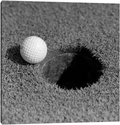 1950s Close-Up Of Golf Ball On Green On Very Edge Of Cup Canvas Art Print - Vintage & Retro Photography