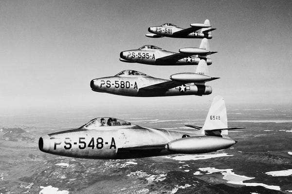 By Air: 1950s Four Us Air Force F-84 Thunderjet Fighter Bomber Airplanes In Flight Formation by Vintage Images