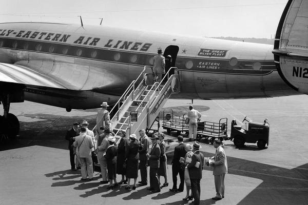 Airplanes: 1950s Group Of Passengers Boarding Commercial Propeller Airplane Washington Dc by Vintage Images