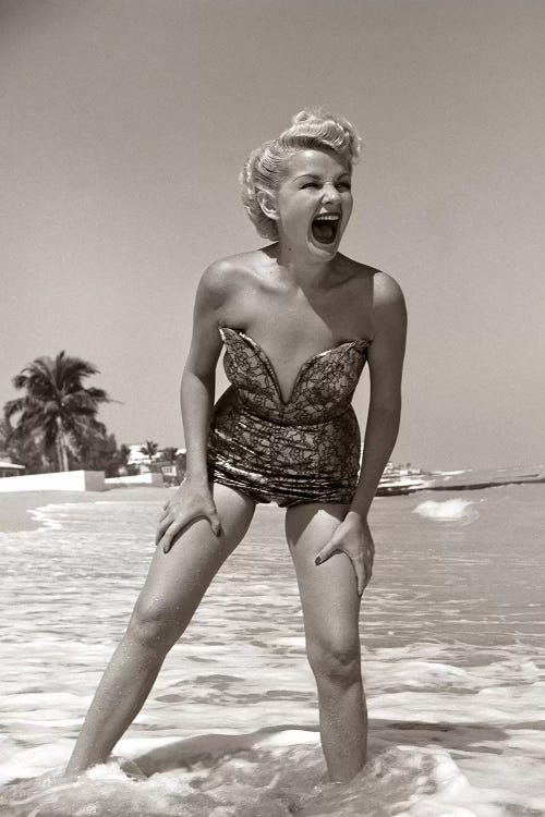 1950s Laughing Blonde Woman In Strapless Low Cut Bathing Suit Swim Wear Wading Up To Ankles In Surf