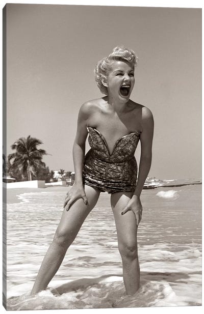 1950s Laughing Blonde Woman In Strapless Low Cut Bathing Suit Swim Wear Wading Up To Ankles In Surf Canvas Art Print - Fashion Photography