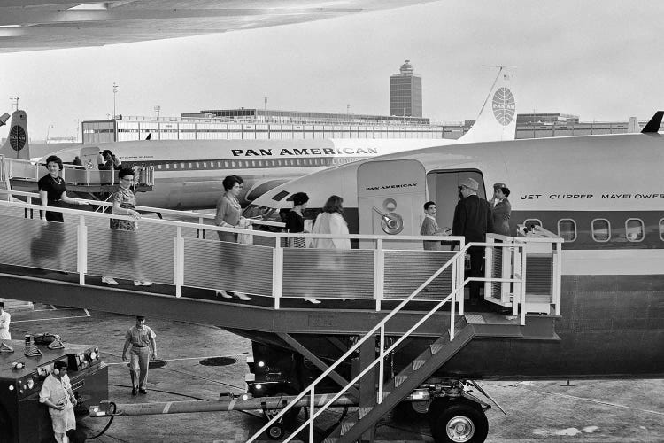 1950s Men And Women Walking Down Ramp Boarding Commercial Jet Airliner Idlewild Airport New York City USA