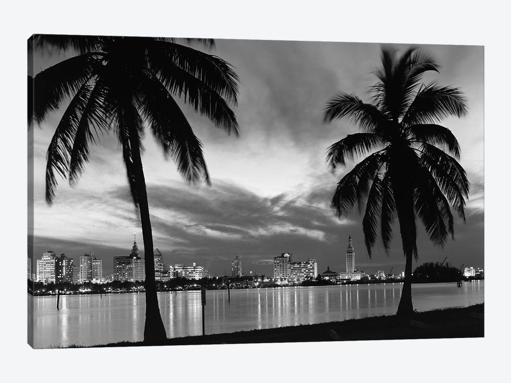 1950s Night Skyline View Across The Bay Two Palm Trees Silhouetted In Foreground Miami Florida USA by Vintage Images 1-piece Canvas Wall Art
