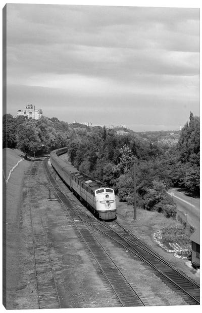 1950s Overhead View Of Streamlined Front Cab Diesel Locomotive Passenger Railroad Train Passing Through Suburban Area Canvas Art Print - Vintage Images