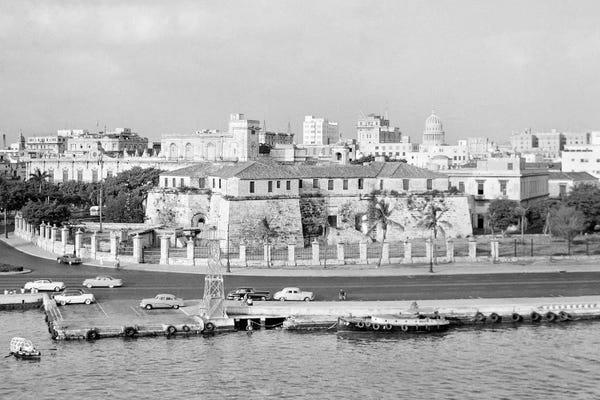 Docks & Piers: 1950s Skyline View Of Castillo de la Real Fuerza In Foreground And Capitol Dome In Distance Havana Cuba by Vintage Images