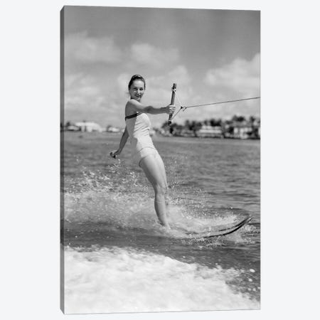 1950s Smiling Woman In Bathing Suit Water Skiing Waving One Hand Looking At Camera Canvas Print #VTG343} by Vintage Images Art Print