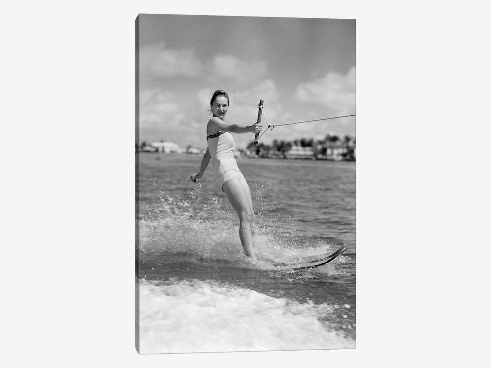 1950s Smiling Woman In Bathing Suit Water Skiing Waving One Hand Looking At Camera by Vintage Images 1-piece Art Print