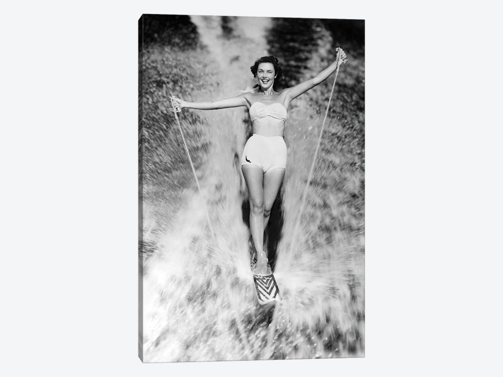 1950s Smiling Woman In White Two Piece Bathing Suit Aquaplaning Water Skiing Looking At Camera by Vintage Images 1-piece Canvas Artwork