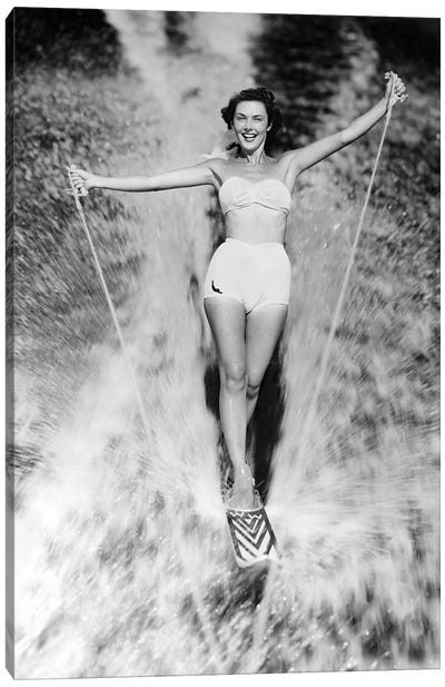 1950s Smiling Woman In White Two Piece Bathing Suit Aquaplaning Water Skiing Looking At Camera Canvas Art Print - Women's Swimsuit & Bikini Art