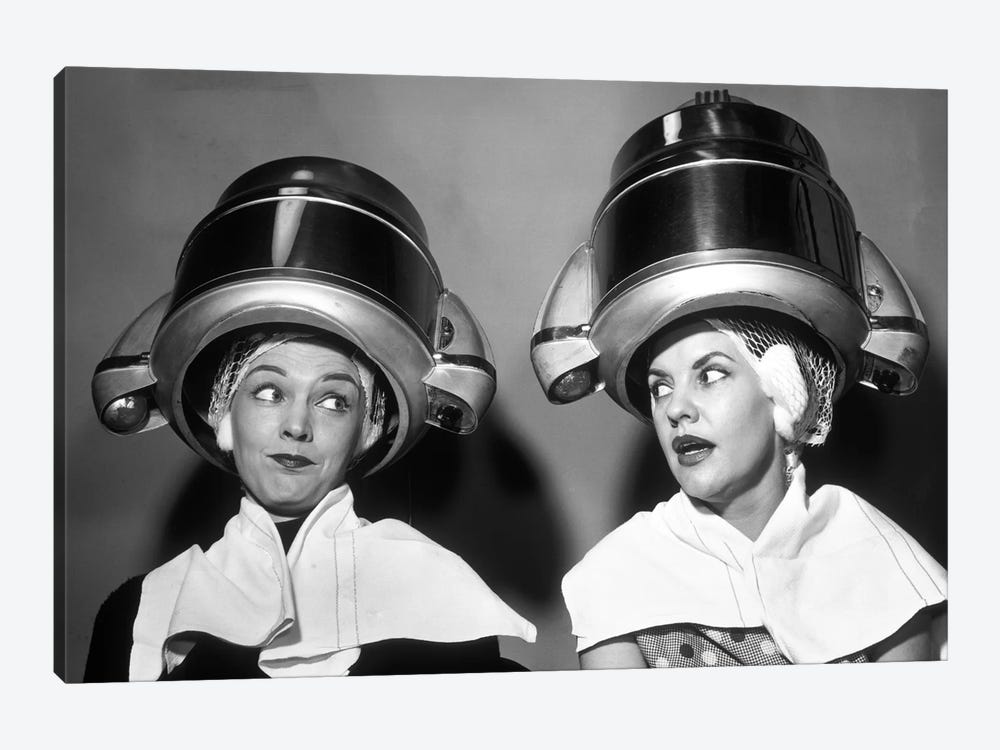 1950s Two Women Sitting Together Gossiping Under Hairdresser Hair Dryer by Vintage Images 1-piece Canvas Wall Art