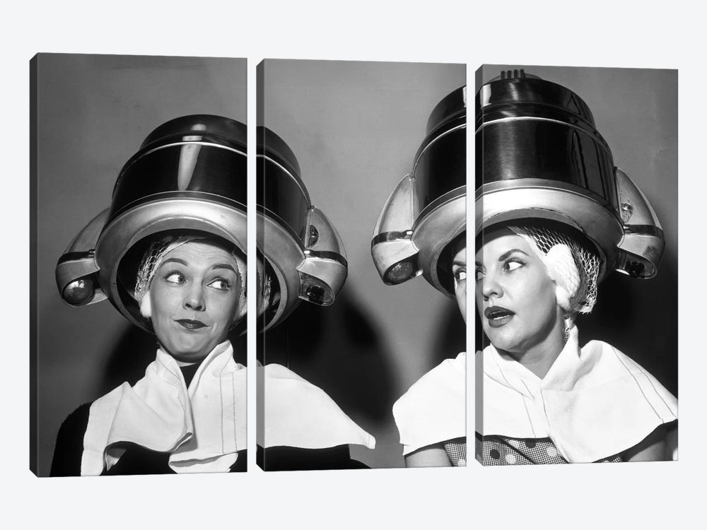 1950s Two Women Sitting Together Gossiping Under Hairdresser Hair Dryer by Vintage Images 3-piece Canvas Art