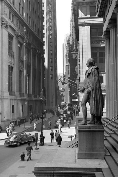 History: 1950s Wall Street From Steps Of Federal Hall National Memorial Looking Towards Trinity Church In New York City USA by Vintage Images