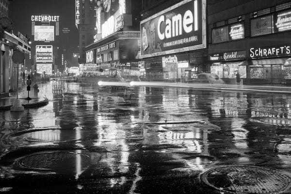 Times Square: 1950s Wet Rainy Streets Of Times Square At Night Neon Signs Advertising New York City NY USA by Vintage Images