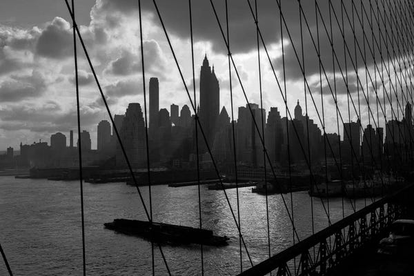 Brooklyn Bridge: 1950s-1960s Downtown Manhattan Skyline From Brooklyn Bridge Barge In East River NYC USA by Vintage Images